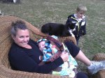 catie harts field with grandchildren and cat